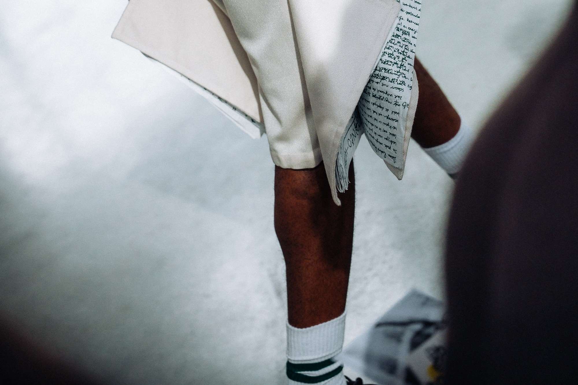 Olayinka trousers with books at REBIRTH by JJAYCE at Weerstand Roermond